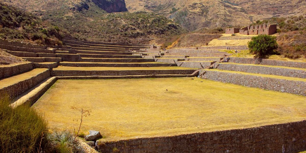 Explore ancient Inca stone terraces at Tipon, Cusco, showcasing historical agriculture and stunning landscapes.
