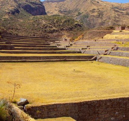 Explore ancient Inca stone terraces at Tipon, Cusco, showcasing historical agriculture and stunning landscapes.